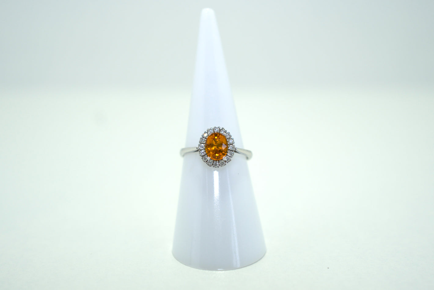 White Gold Ring with Orange Sapphire and Diamonds