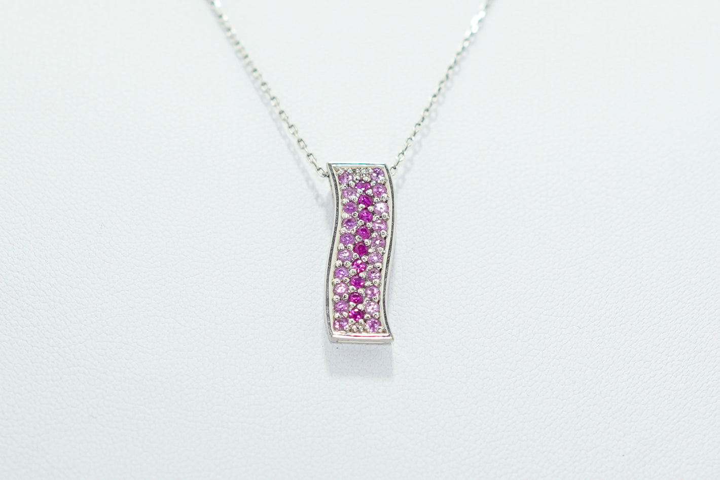 White Gold Pendent With Light and Dark Pink Sapphires