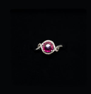 White Gold Ring with Pink sapphire and Diamonds